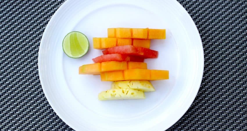 sliced of carrots and pineapple on plate